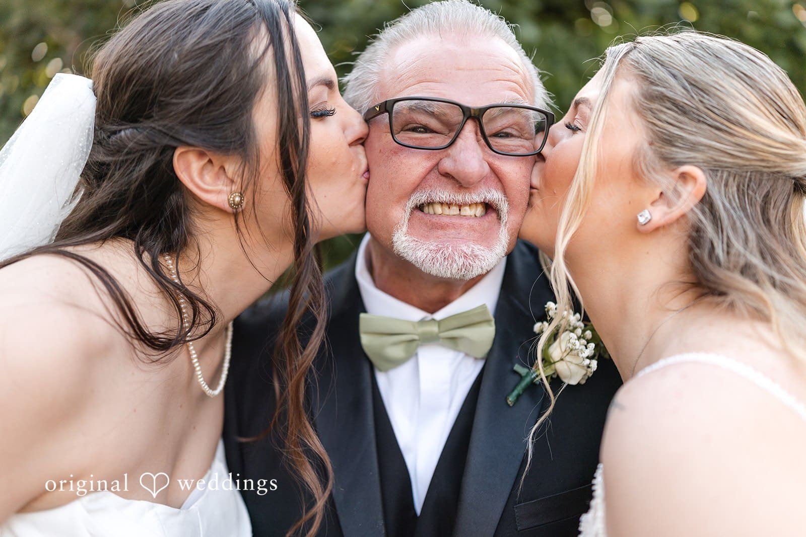 Brides kissing a man with love at Hacienda Los Robles.