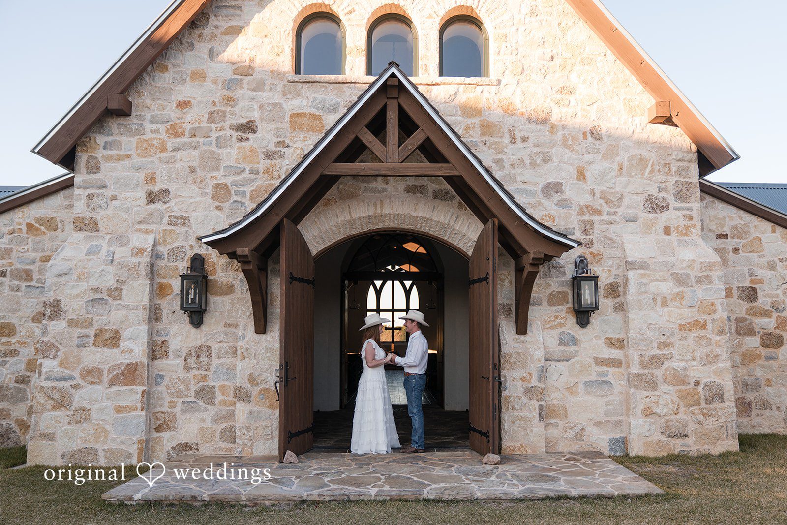 In front of a charming chapel, they celebrate their union, beautifully captured by austin wedding photographers.