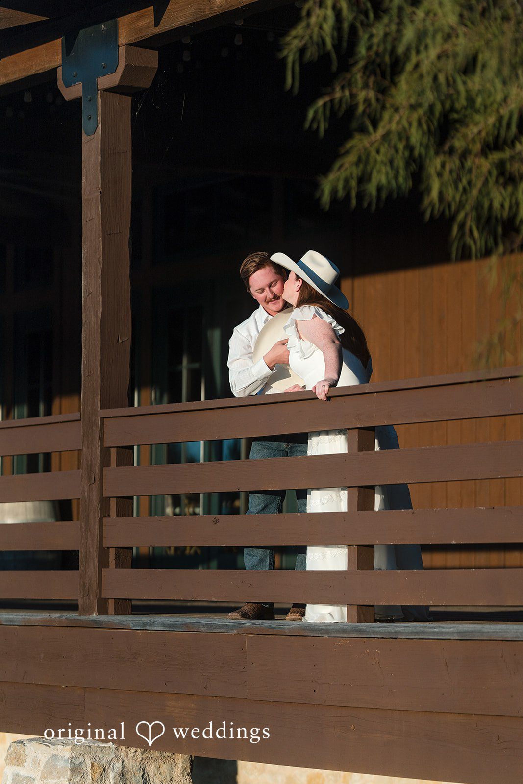A quiet embrace on a wooden balcony captures their deep connection.