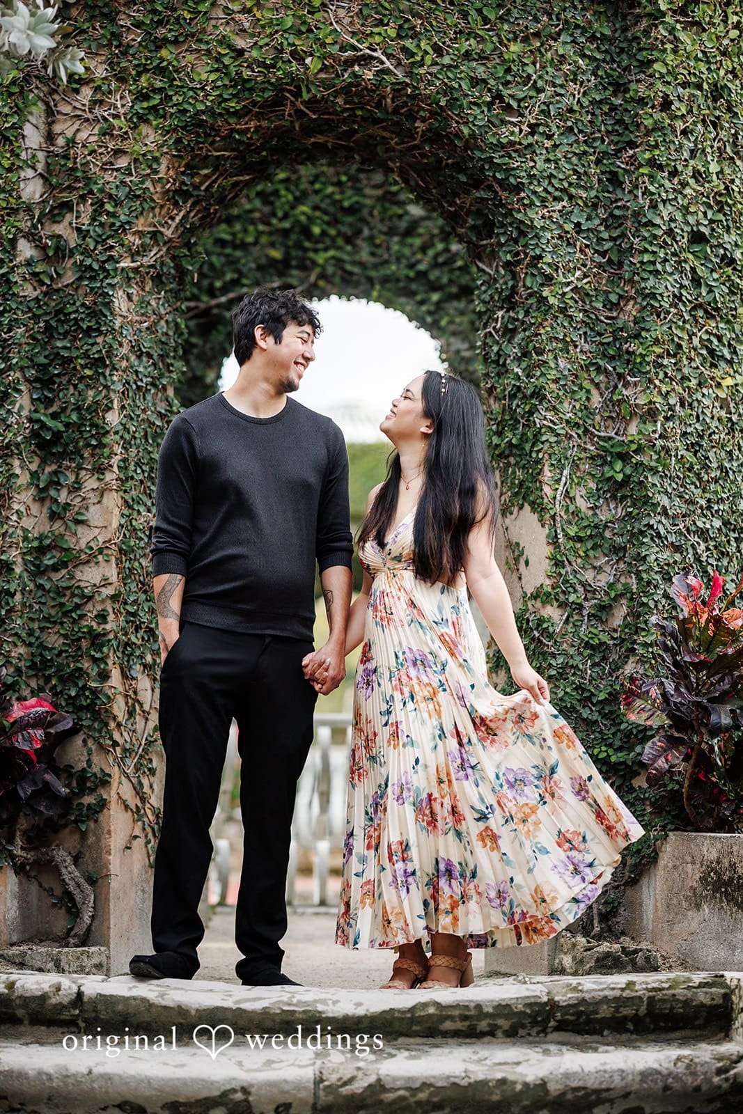 Kristian + Fernando Close-up of couple looking at each other with soft smiles at Vizcaya Museum & Gardens