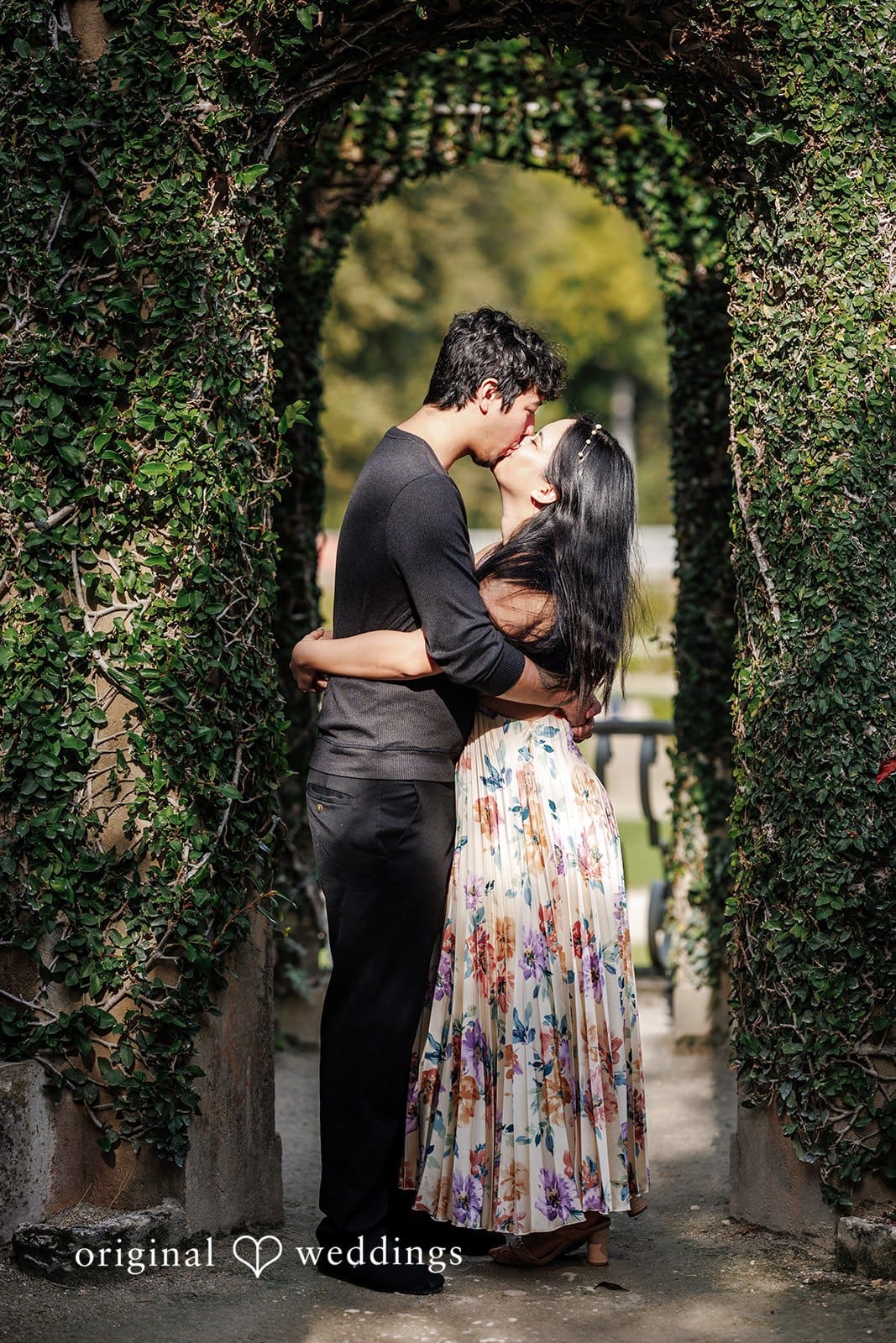 Kristian + Fernando Close-up of couple kissing with soft background at Vizcaya Museum & Gardens