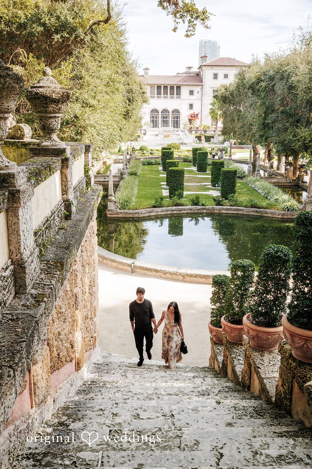Kristian + Fernando Close-up of couple smiling while going upstairs at Vizcaya Museum & Gardens