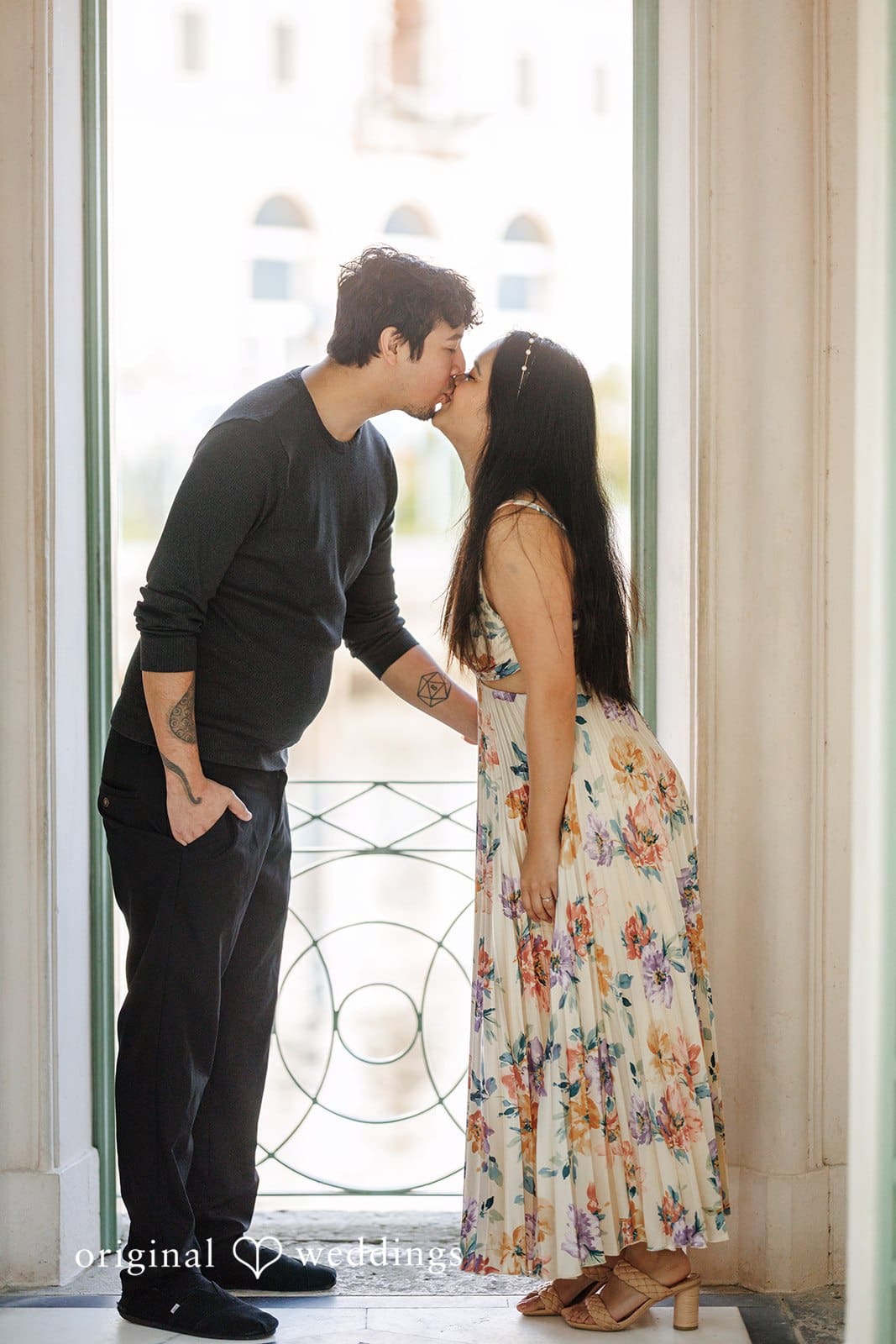 Kristian + Fernando Original Weddings capturing romantic kiss at Vizcaya Museum & Gardens