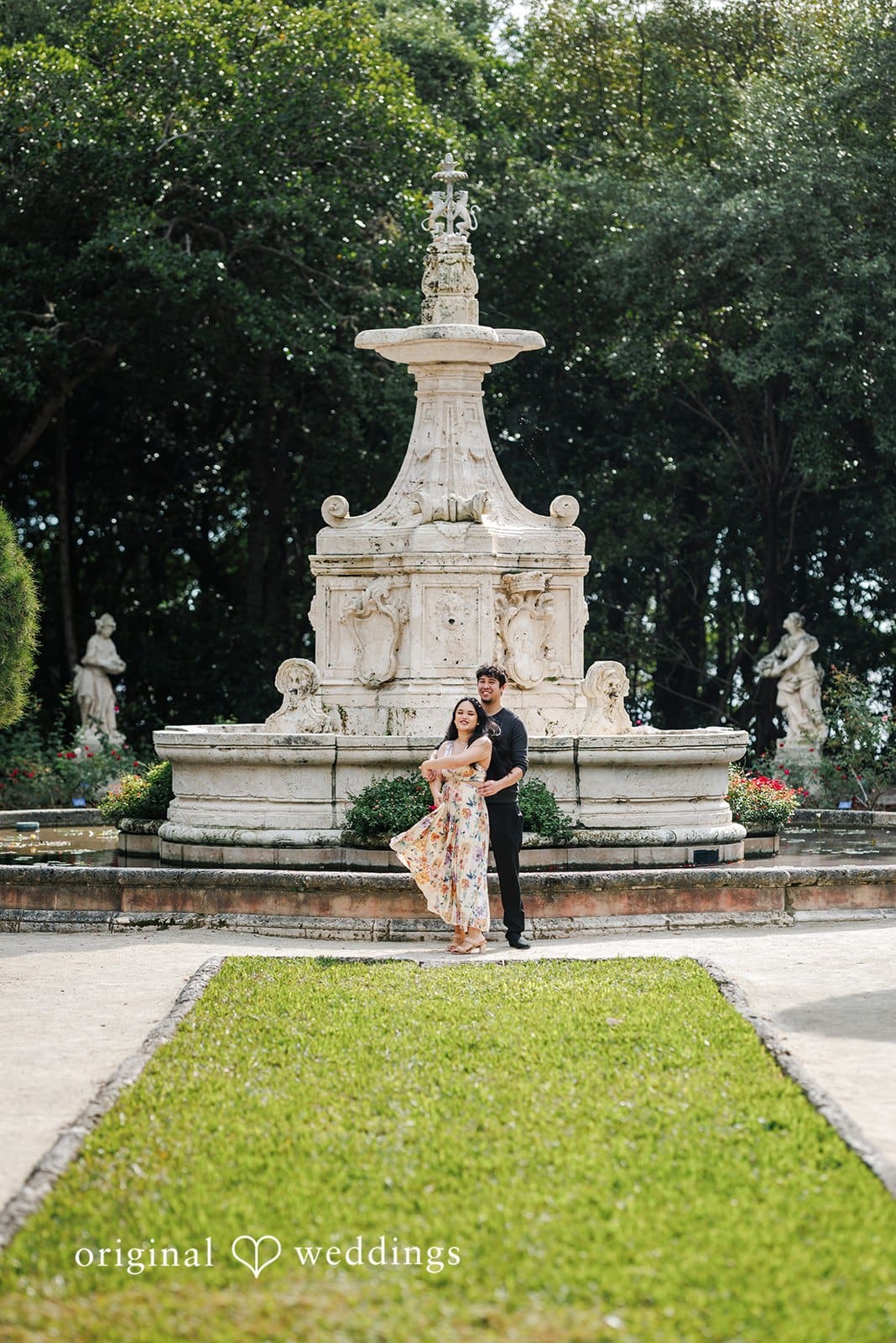 Kristian + Fernando Loving couple posing together outside Vizcaya Museum & Gardens