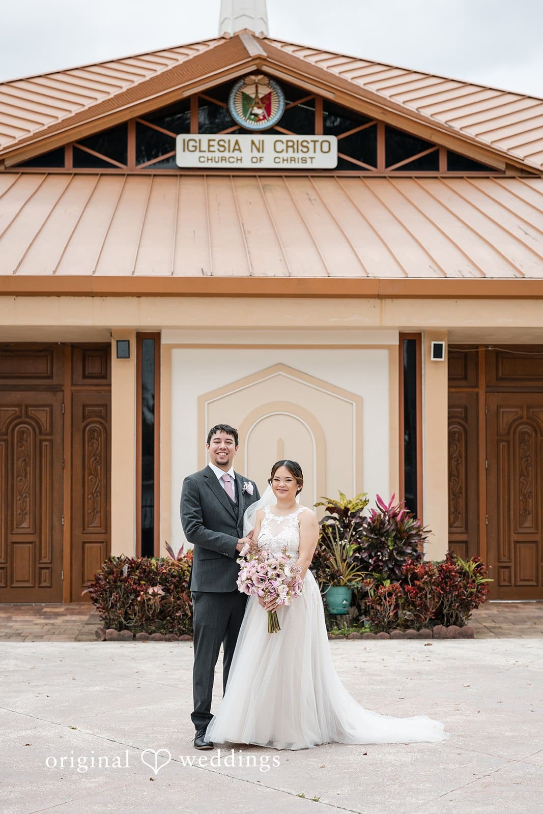 Wedding couple in formal attire.