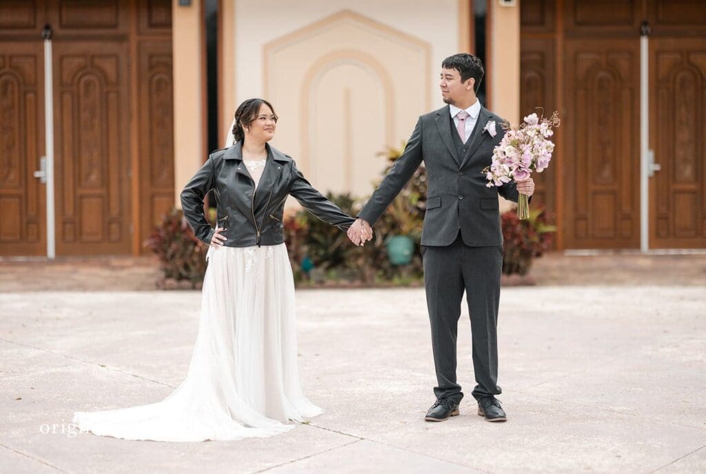 Portrait of couple at Iglesia Ni Cristo by Miami wedding photographer from original wedding.
