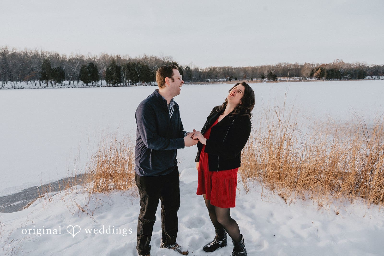 The couple laughed so hard amidst the beautiful snowy environment