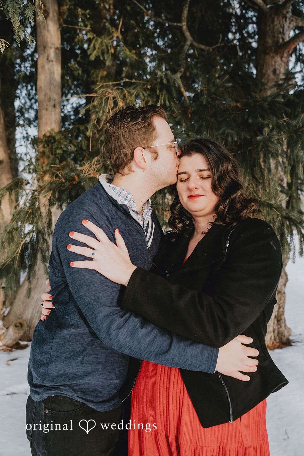 Our Detroit wedding photographer captured the moment Nick gave Rachel a head peck