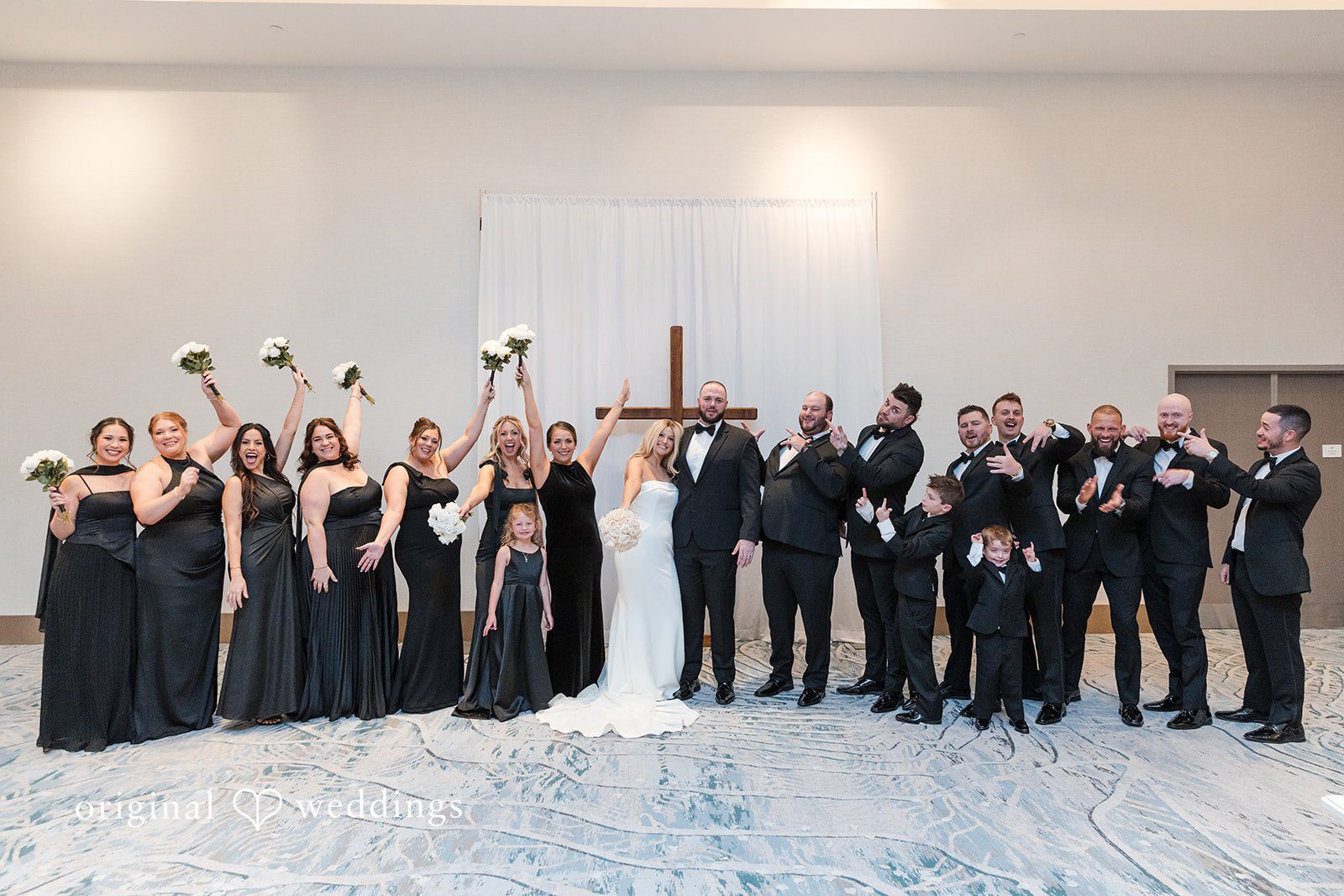 Couple portrait with group at JW Marriott Clearwater Beach Resort.