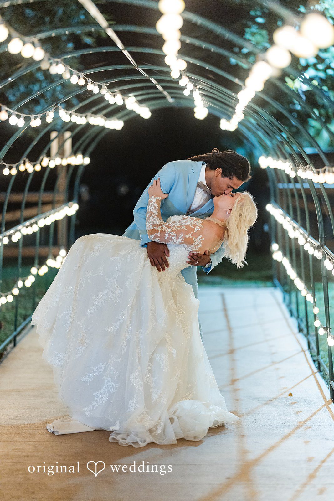 Bride and groom sharing a kiss at Lovely Barn
