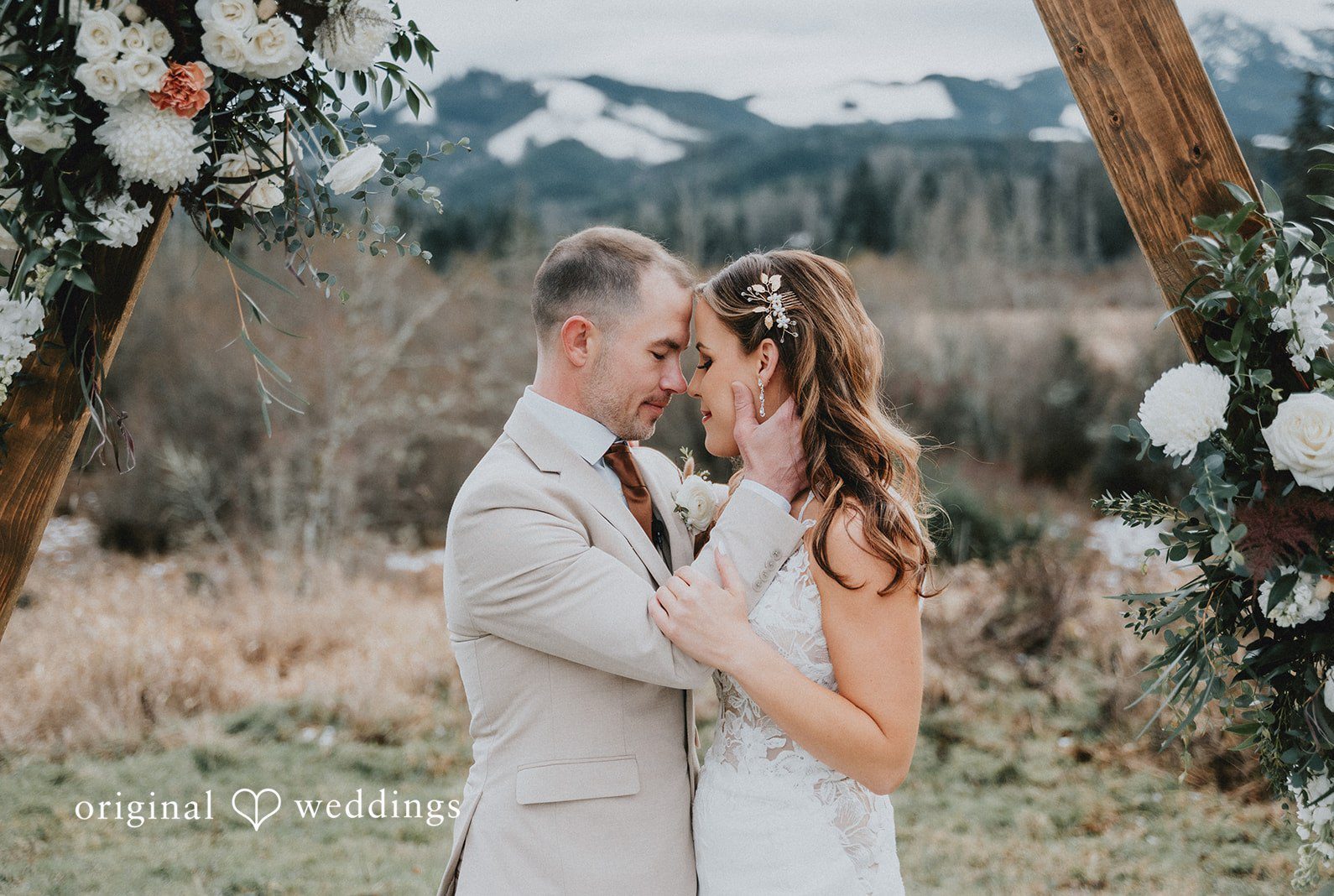 Romantic picture of couple by Seattle wedding photographer from original wedding in backyard.