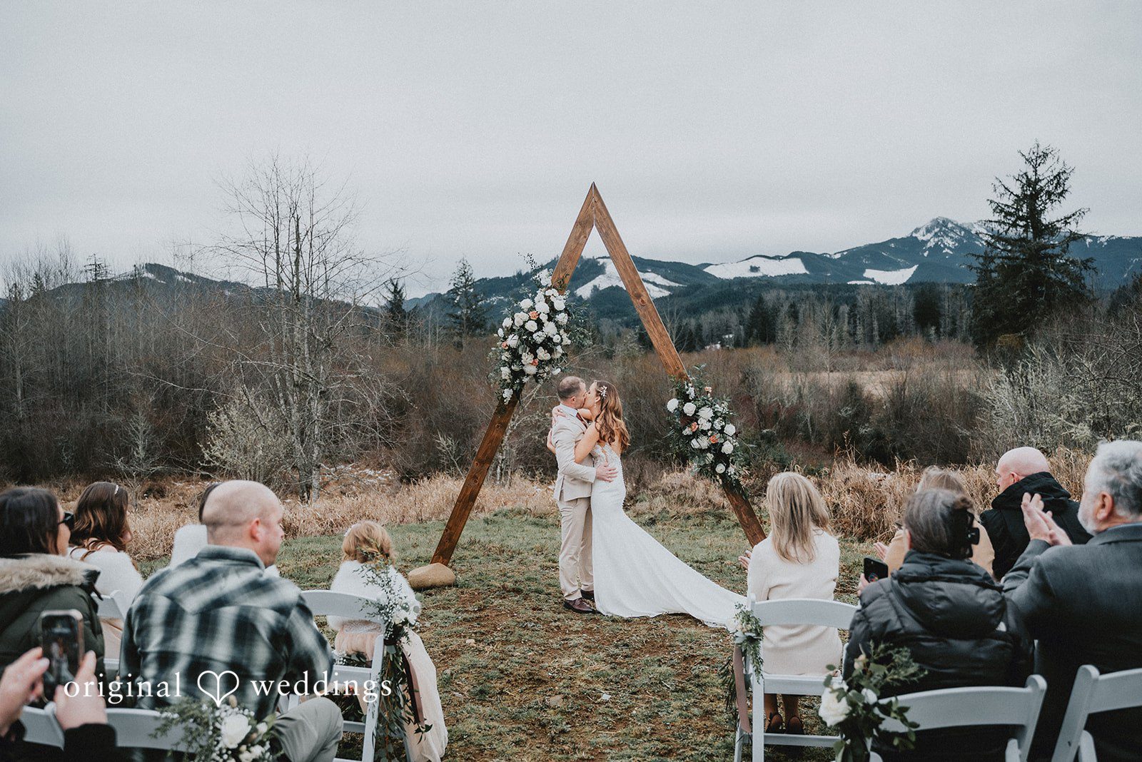 Kelsey + Adam First kiss after ceremony done at washington backyard wedding,