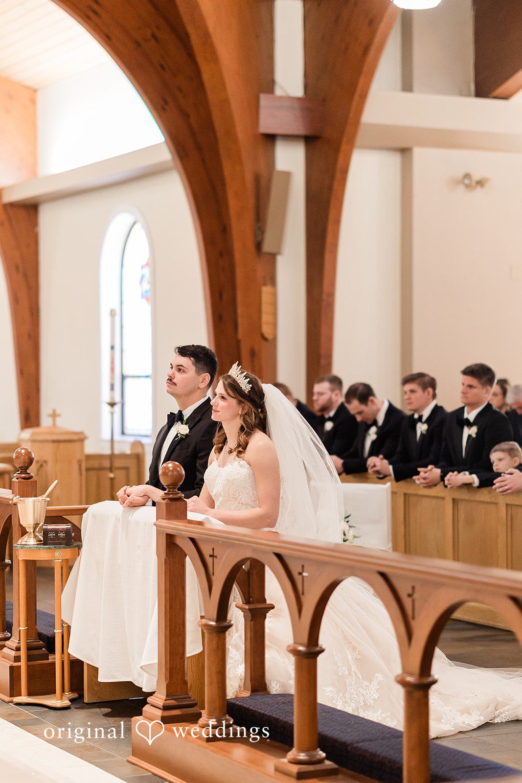 Celine + Cassin Couple embracing during wedding ceremony.