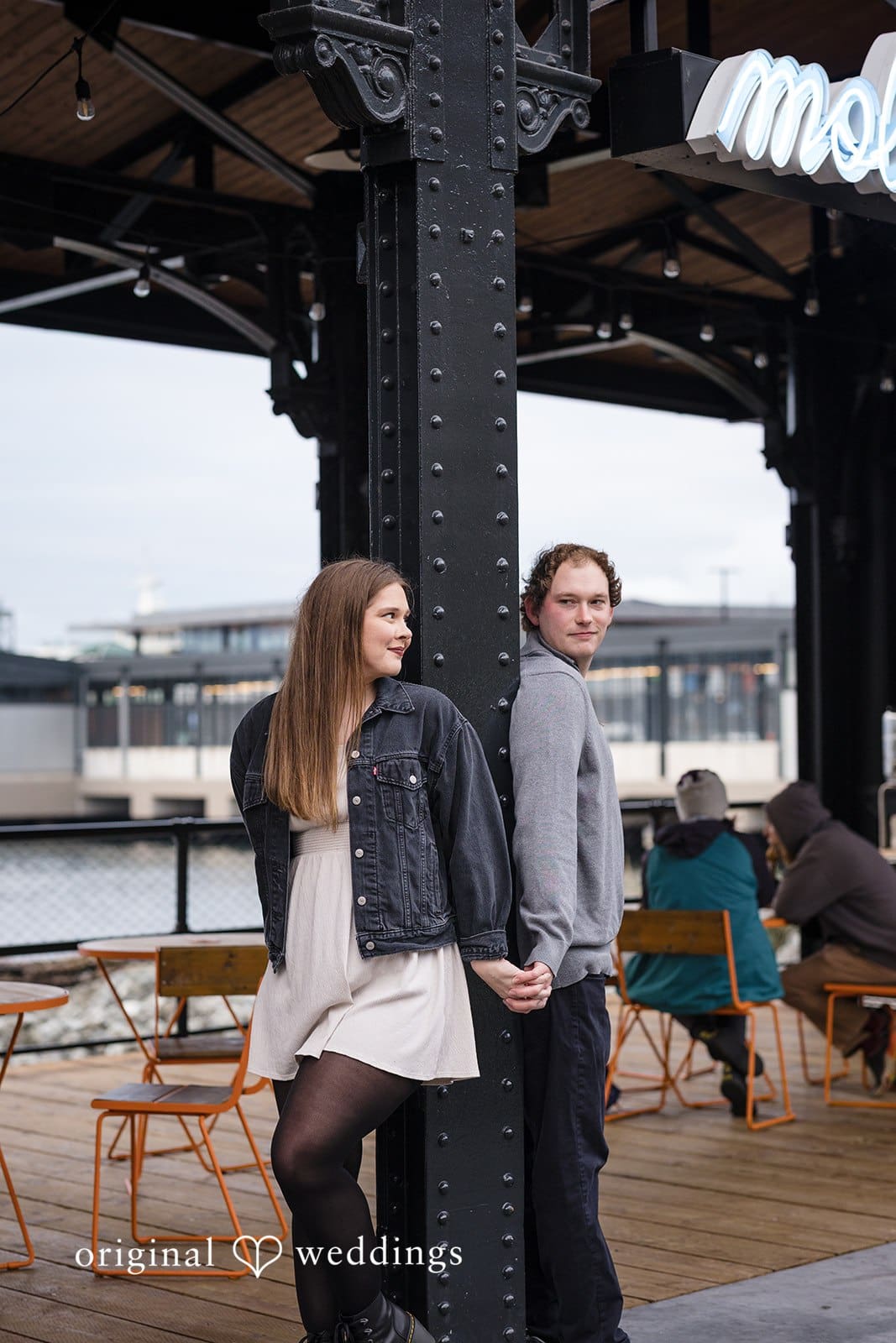 Hailey + William Our Seattle wedding photographer took a beautiful shot of the couple on the dock