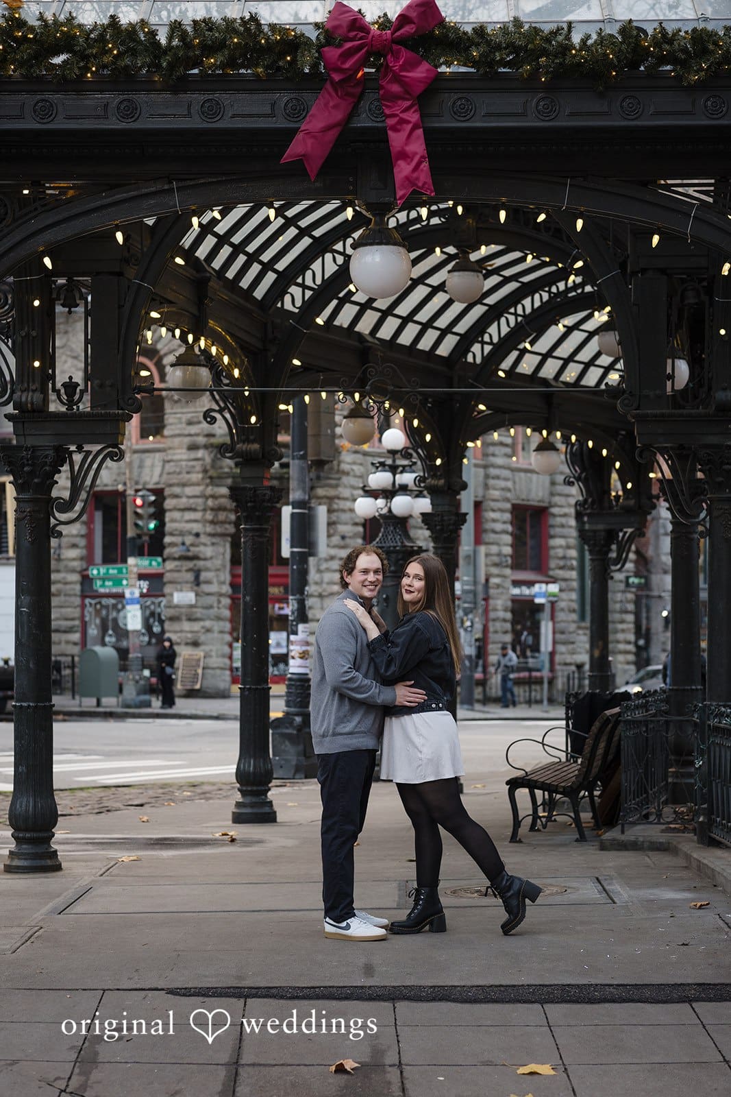 Hailey + William A beautiful portrait of the couple in front of Pioneer Square