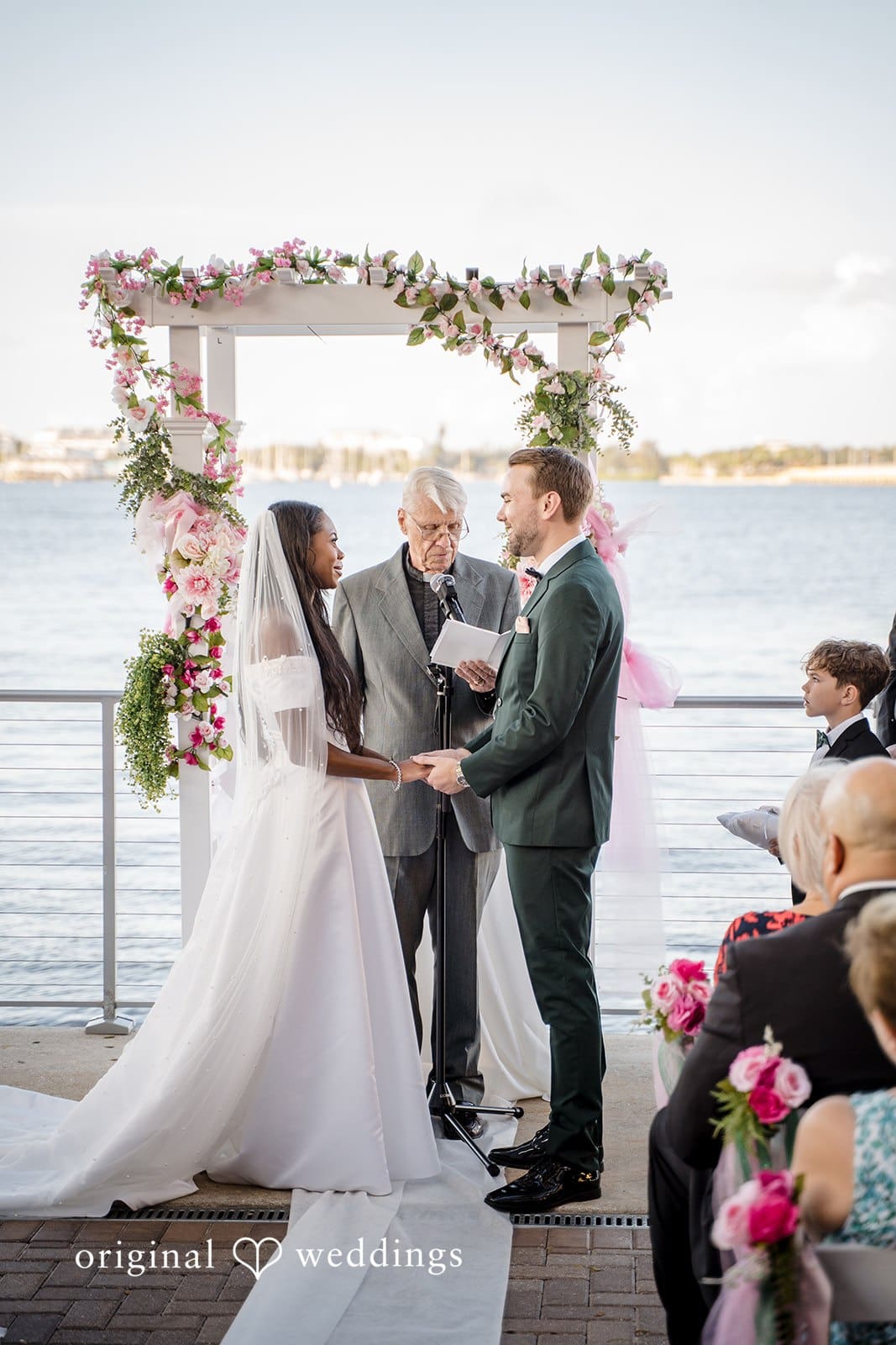 The couple’s excitement and happiness are visible during the ceremony.
