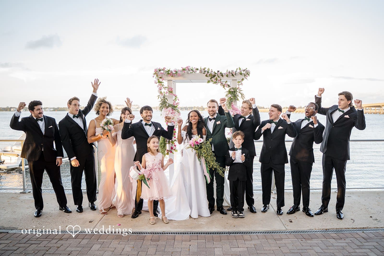 A joyful group photo is taken with all the guests.