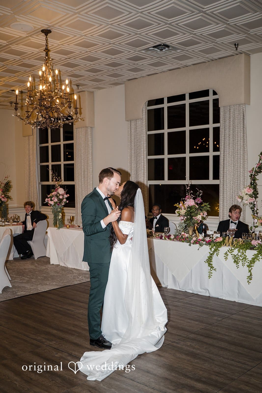 They perform their first dance in a magical atmosphere.