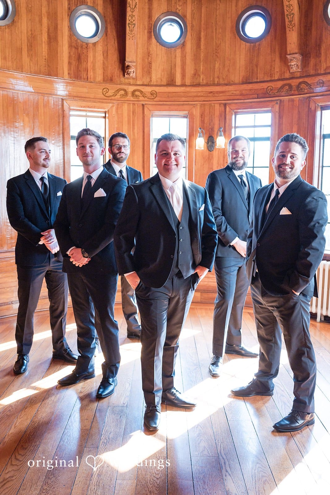 Nicole + Hunter Groom with groomsmen posing together before ceremony