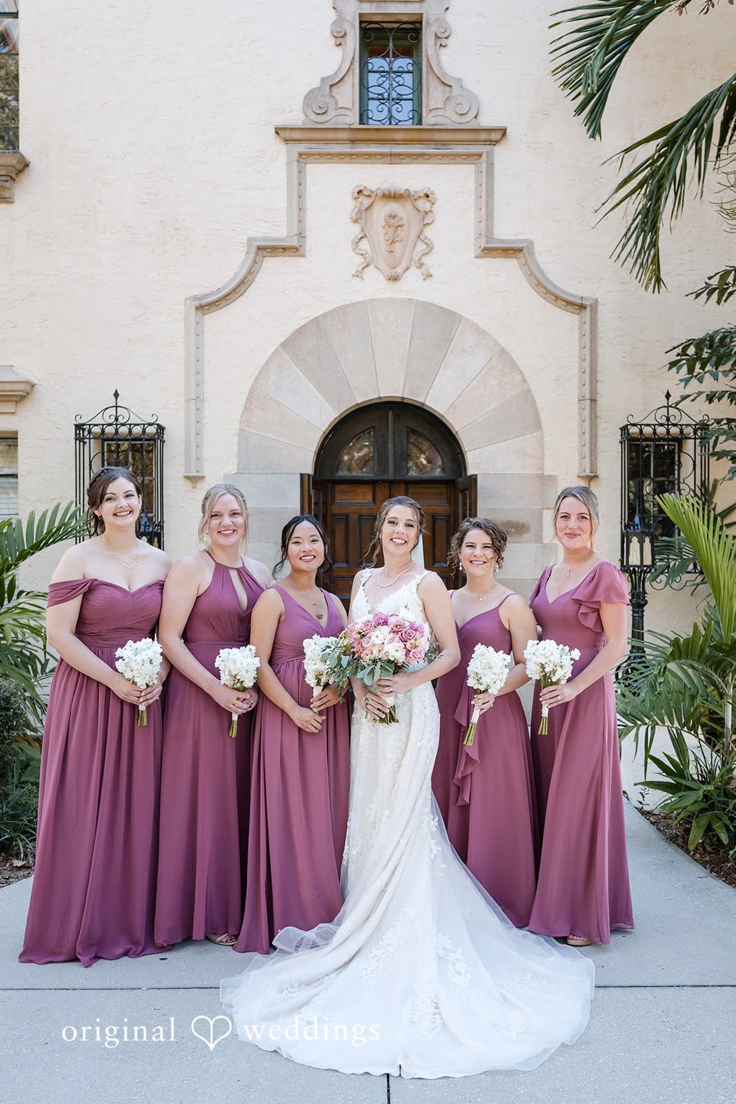 Nicole + Hunter Bride with bridesmaids sharing joyful moment before ceremony
