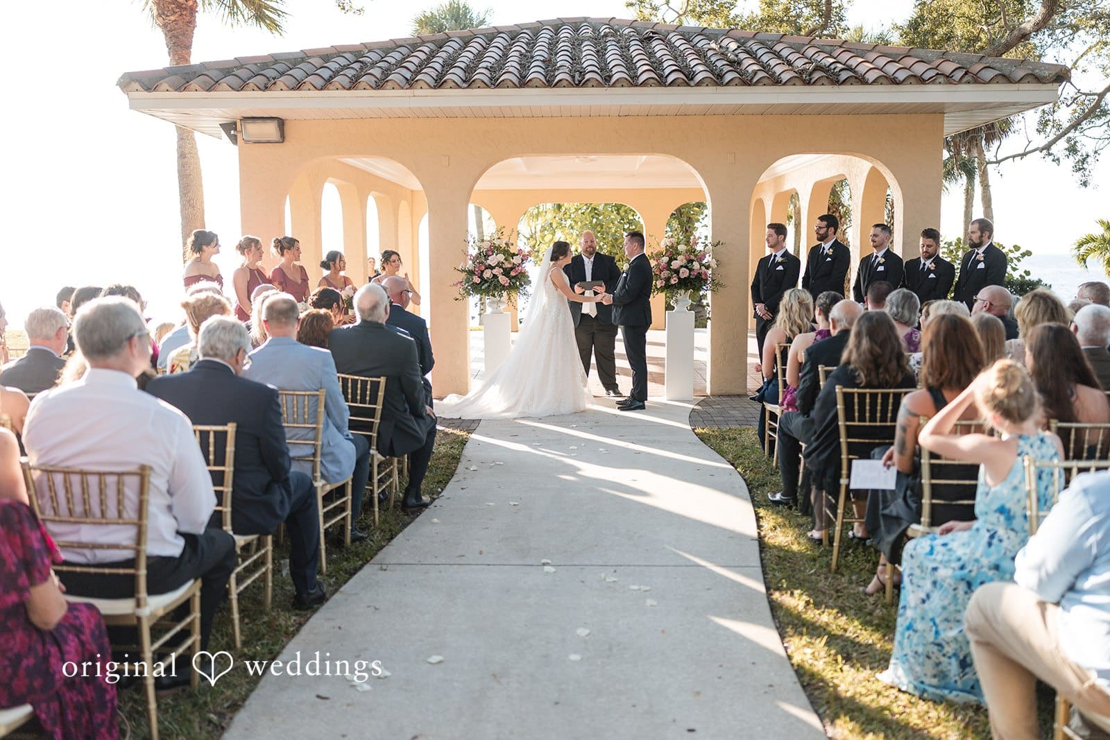 Nicole + Hunter Wedding couple sharing a loving moment holding hands at Powel Crosley Estate