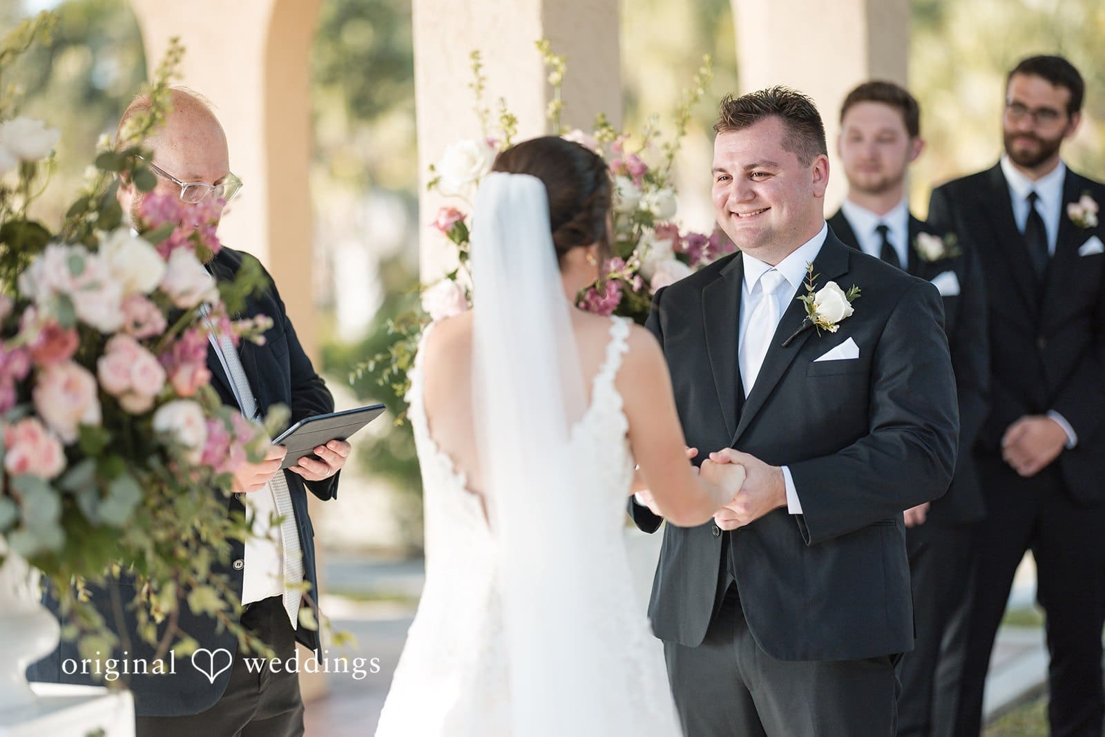 Nicole + Hunter Groom smiling during wedding ceremony