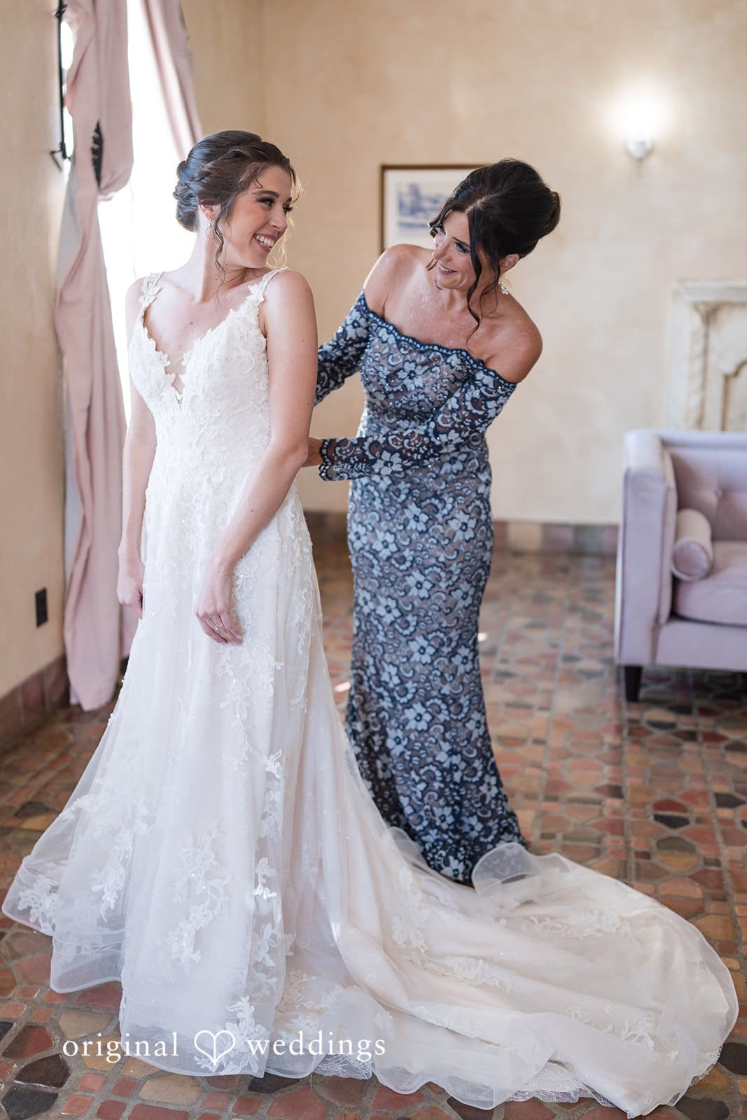 Nicole + Hunter Bridesmaid helping bride get ready