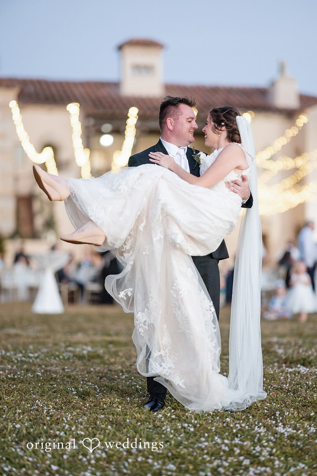 Nicole + Hunter Romantic moment of groom carrying bride at Powel Crosley Estate