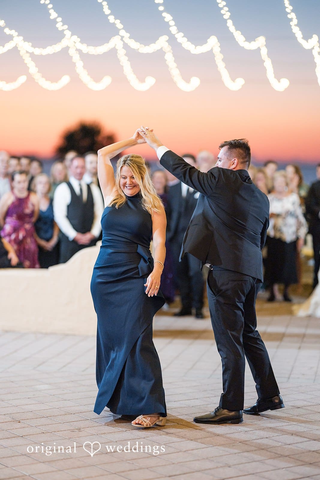 Nicole + Hunter Groom dancing with his mother during reception celebration