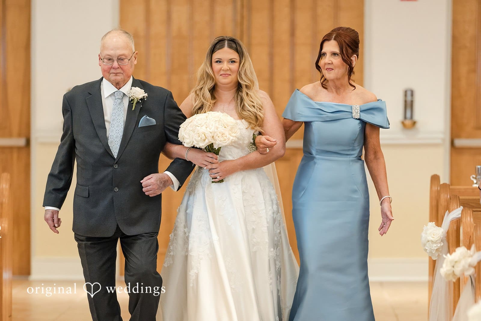 Our Miami wedding photographers captured the emotional moment when the bride's parents walked her down the aisle