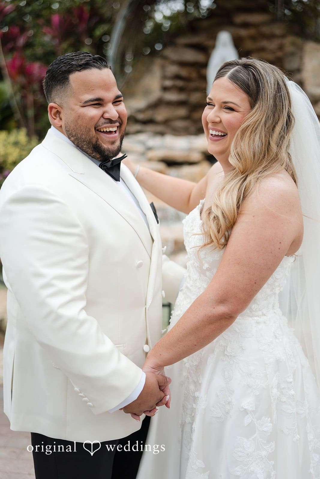 Our Miami wedding photographers captured a happy portrait of the couple after their church wedding ceremony