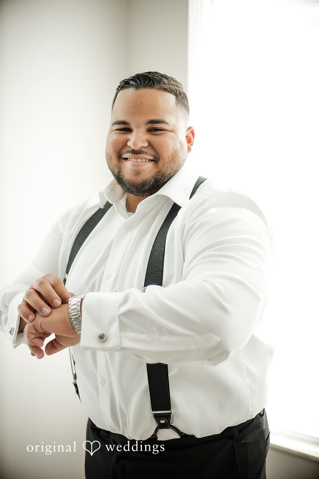 A getting-ready moment for the groom at Prestige Estate