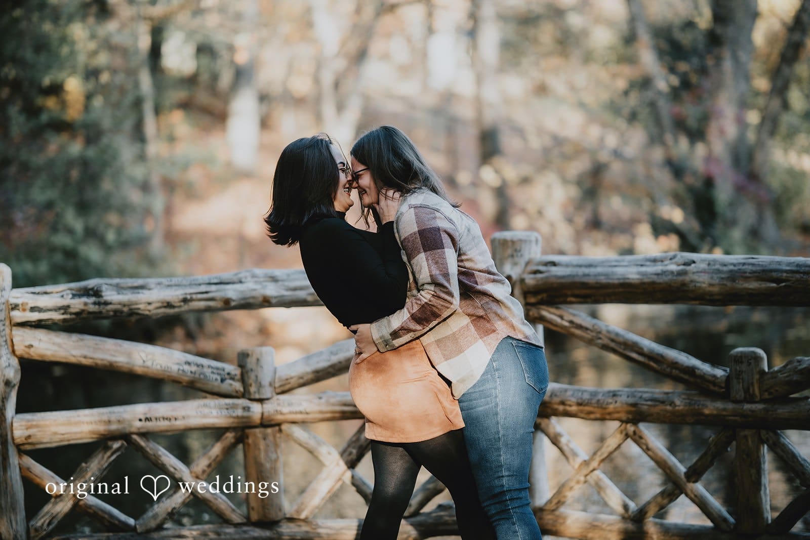 Molly + Alexis Our New York wedding photographer took a romantic portrait of Alexis and Molly at the dock