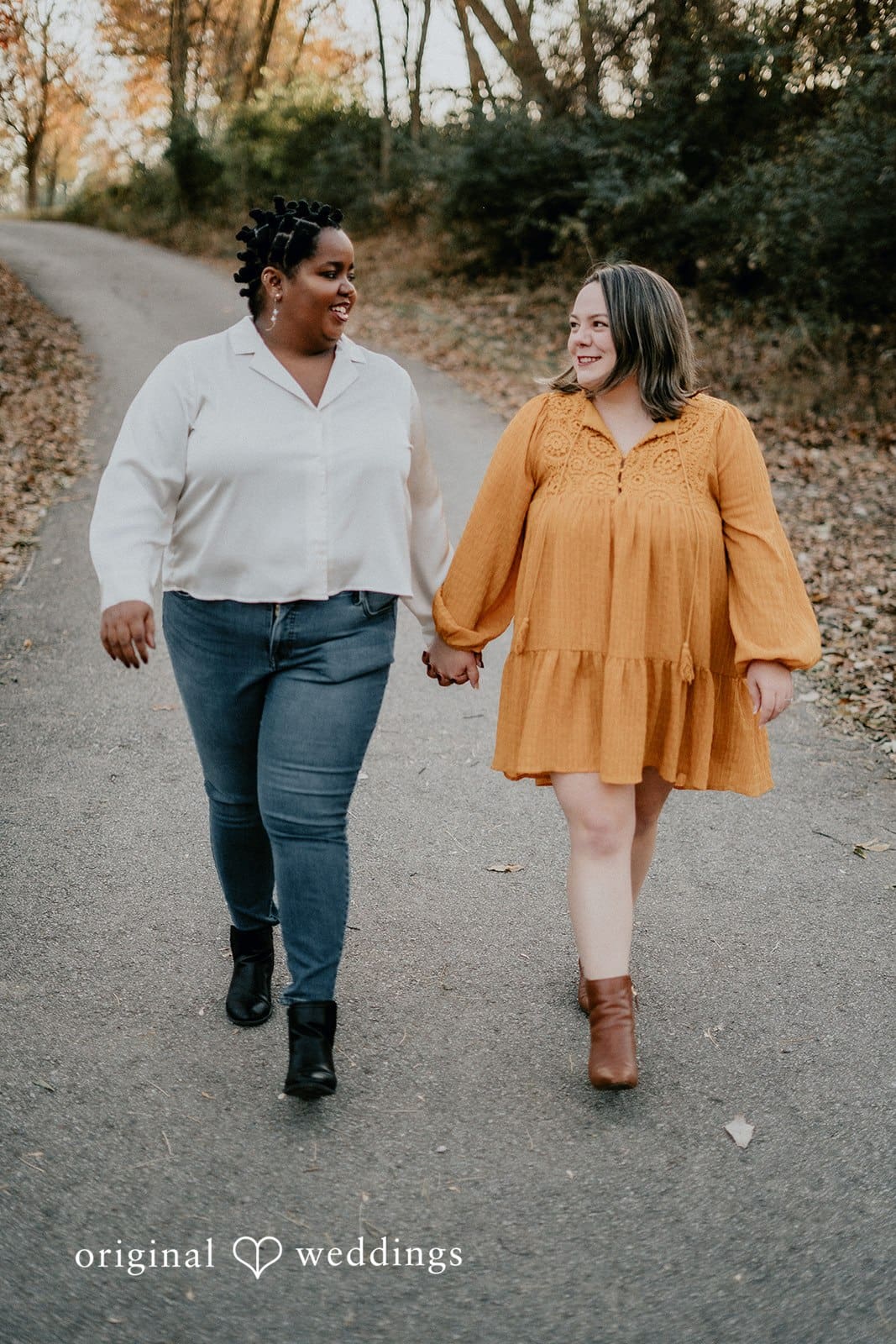 A portrait of the couple taking a walk at Queeny Park