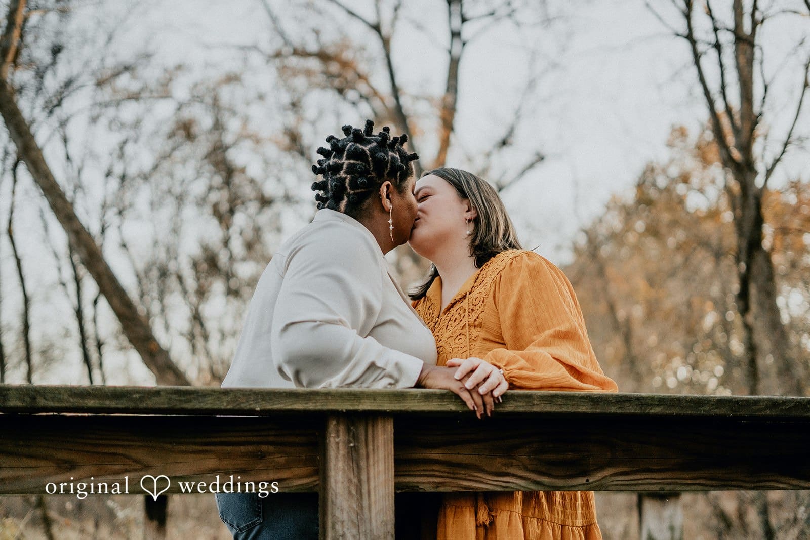 The couple shares a kiss at Queeny Park