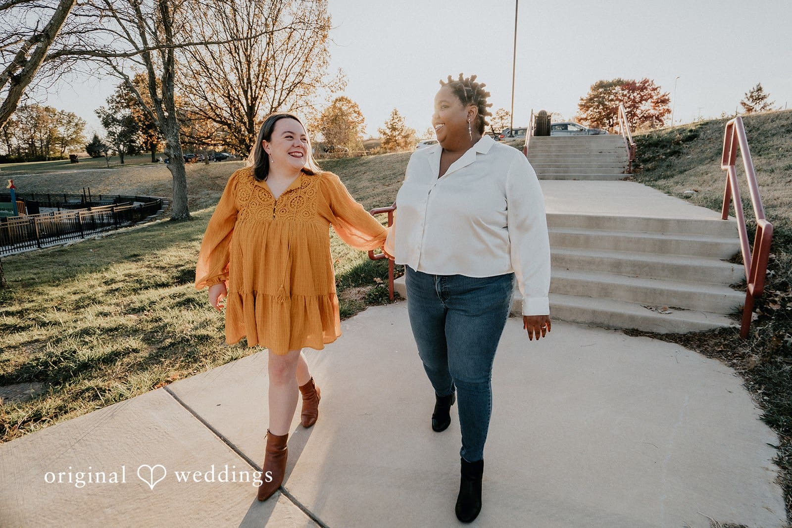 A portrait of the couple taking a walk at Queeny Park