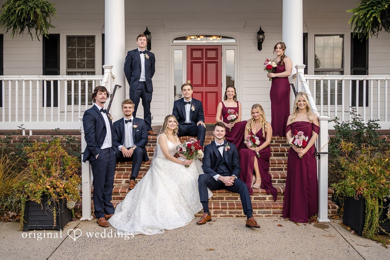 Our Washington DC wedding photographer at Original Weddings took a romantic portrait of the couple by the golf course pond at Fairfax Country Club after their ceremony at the Saint Mary of Sorrows Catholic Church