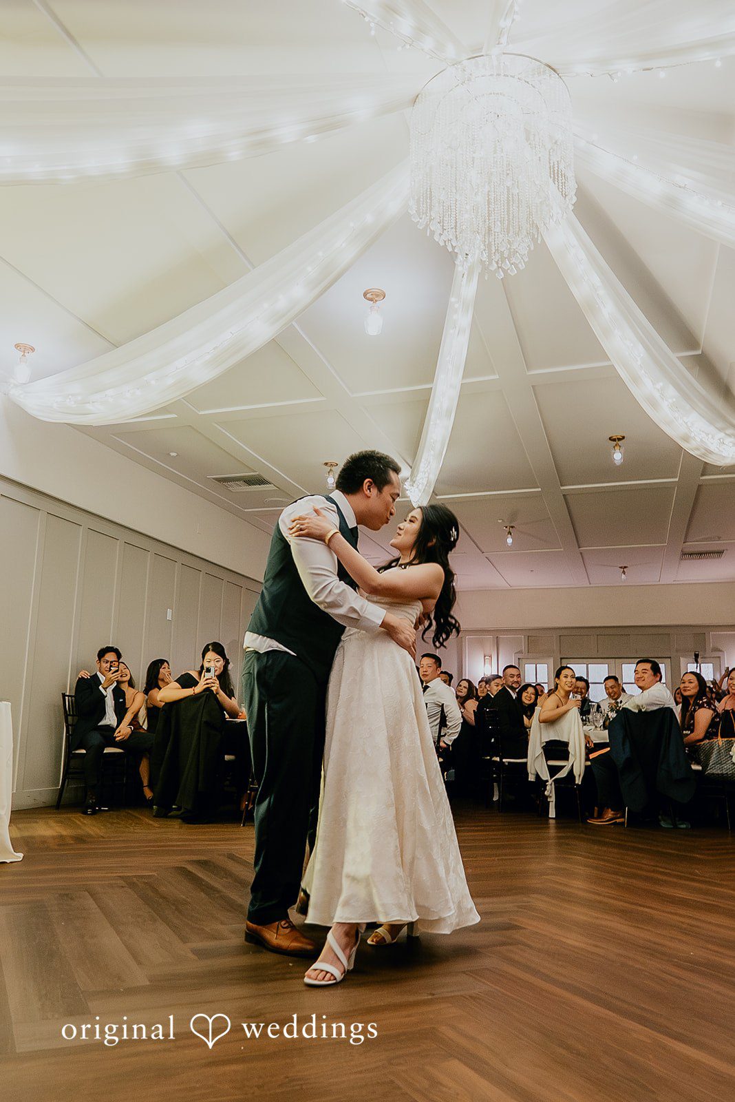 A romantic moment for the couple at San Ramon Waters reception hall