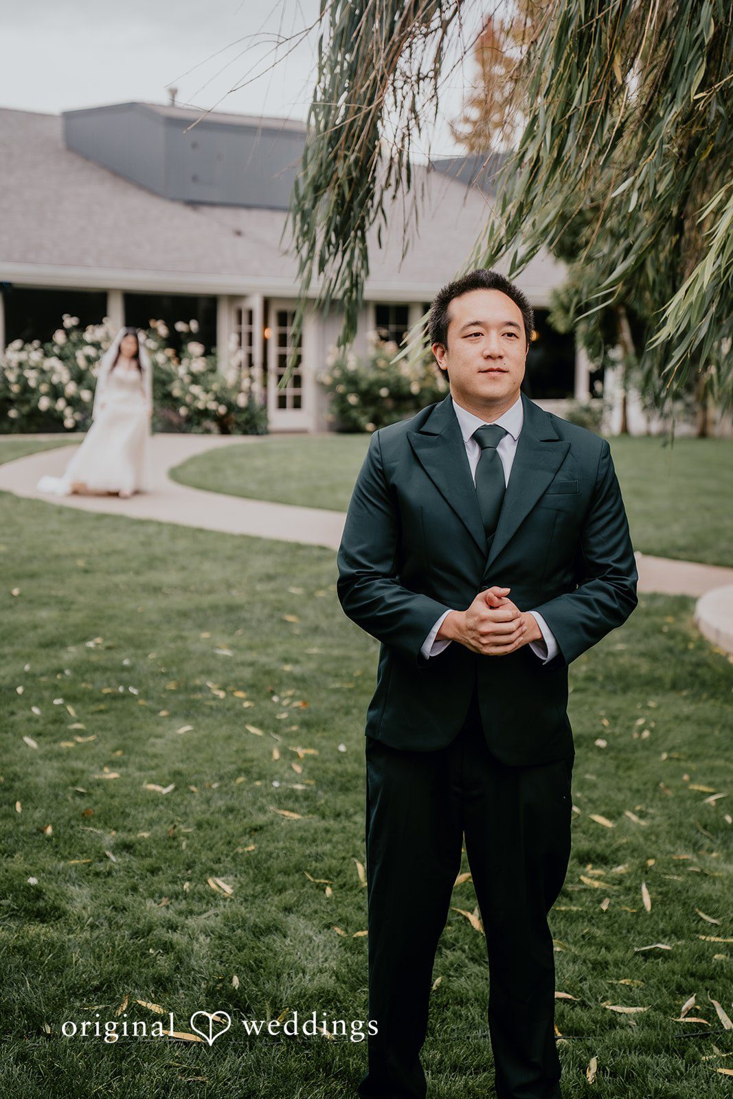 A portrait of the bride approaching the groom