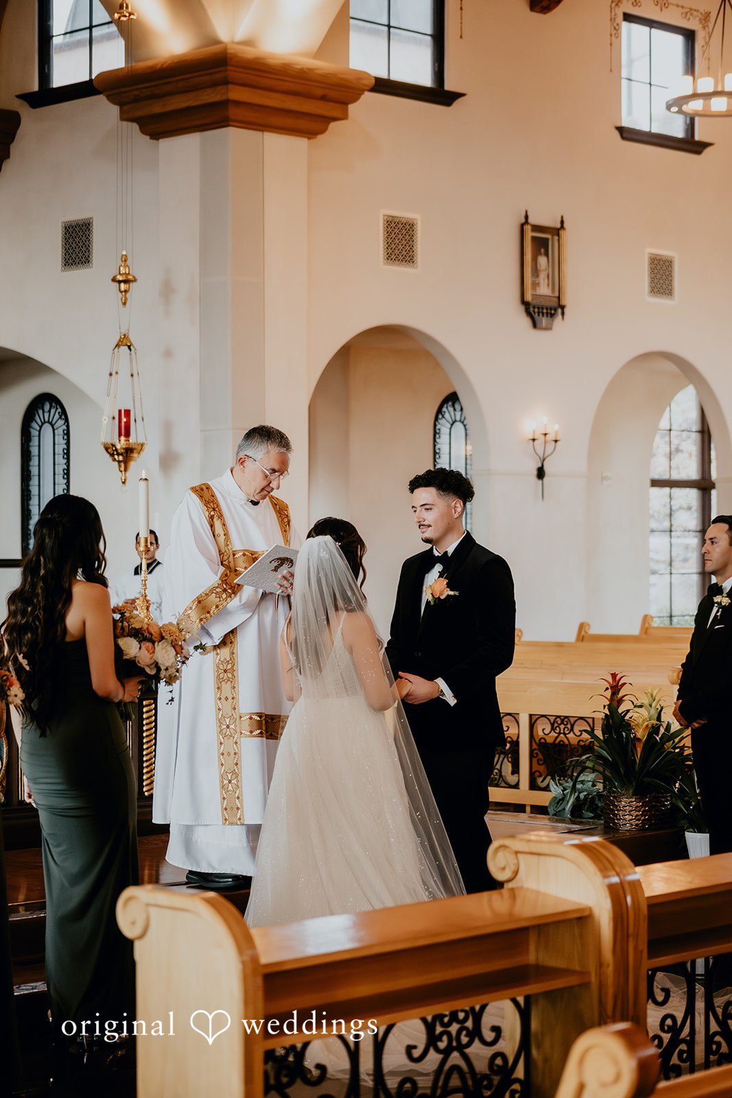 Jakob + Flowreen A portrait of the couple exchanging marital vows