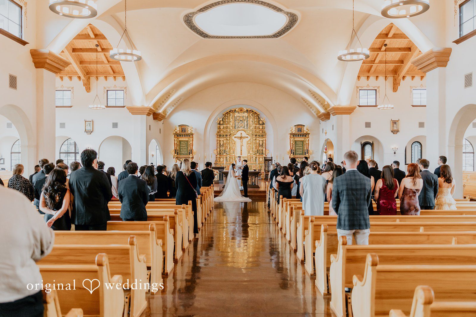 Jakob + Flowreen A beautiful San Diego photography that shows the wedding ceremony at St Gabriel Catholic Church