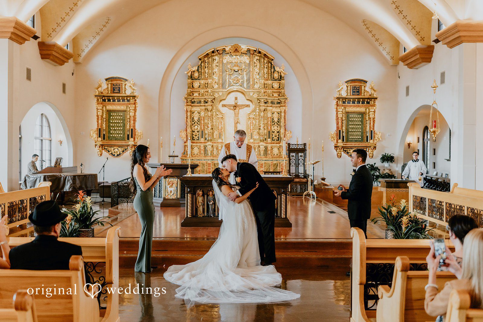 Jakob + Flowreen The couple seals their union with a romantic kiss