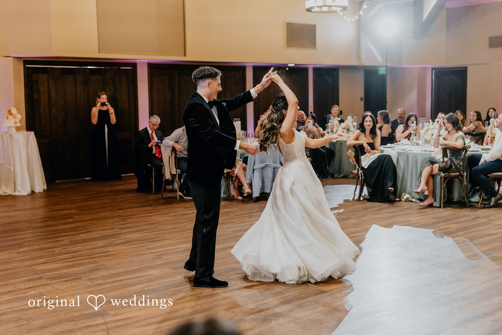 Jakob + Flowreen The couple’s first dance at St Gabriel Catholic Church wedding reception hall