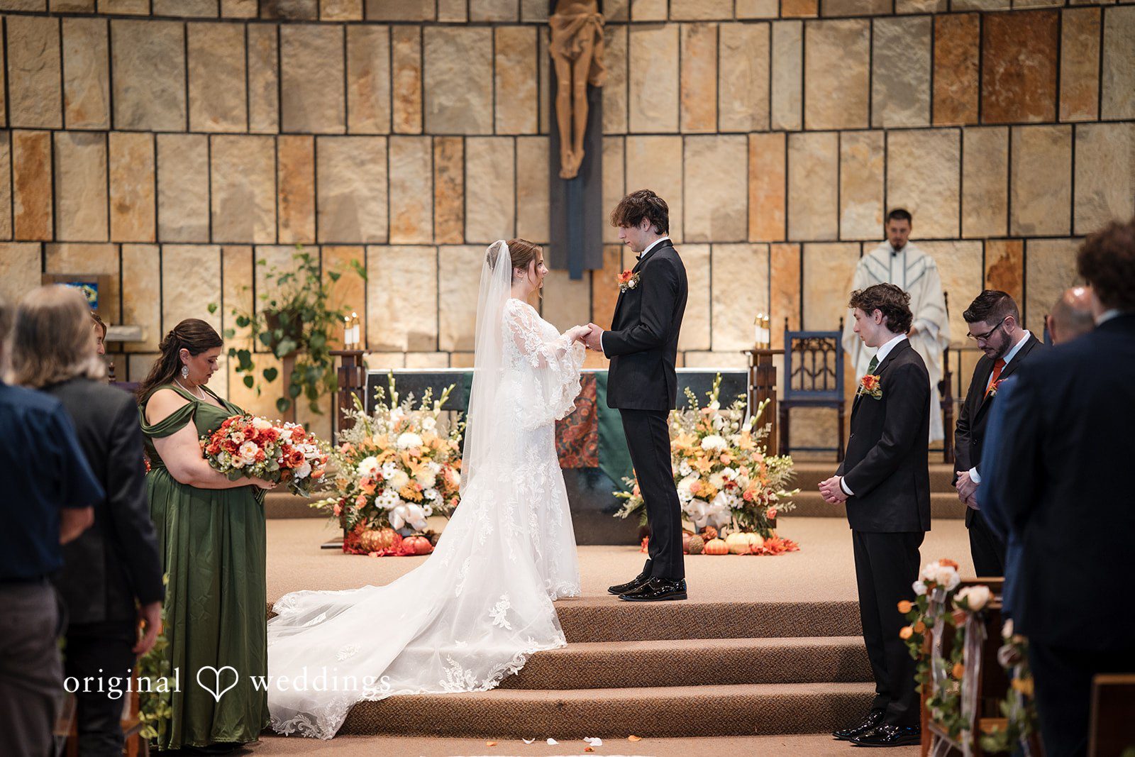 The bride at groom about to exchange marital vows at St Joseph Church