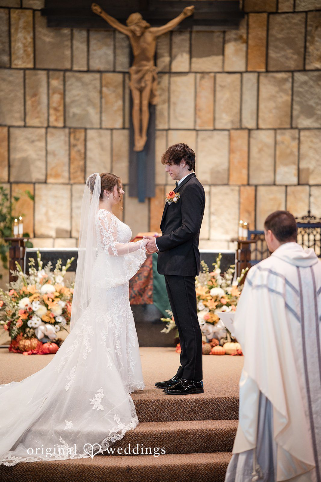 A heartfelt moment the bride and groom exchange marital vows