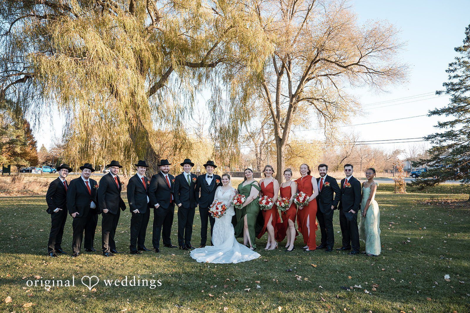 Our Milwaukee wedding photographers at Original Weddings captured a beautiful portrait of the couple and their bridal party after their St Joseph Church ceremony