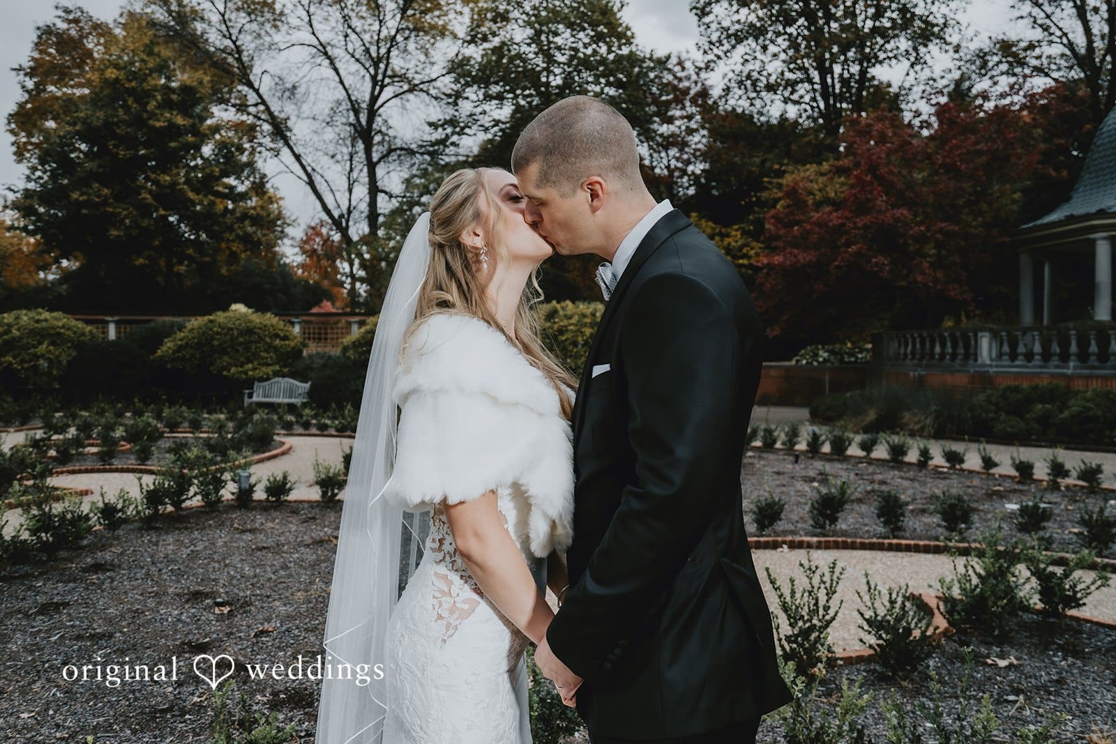 A romantic portrait of the bride and groom after their St. Louis Botanical Gardens wedding ceremony