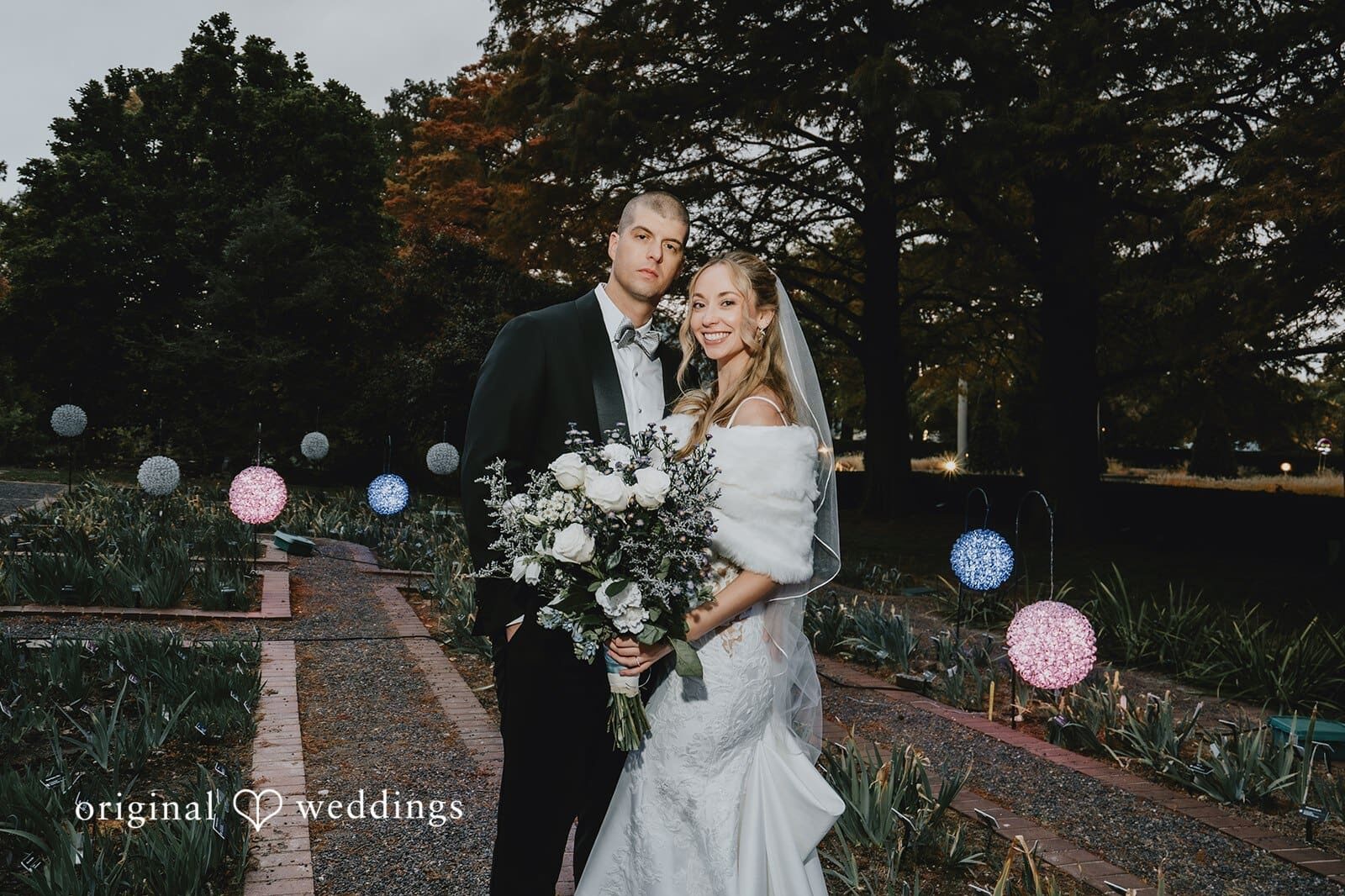 Original Weddings took a stunning portrait of the bride and groom at St. Louis Botanical Gardens, a Missouri wedding venue