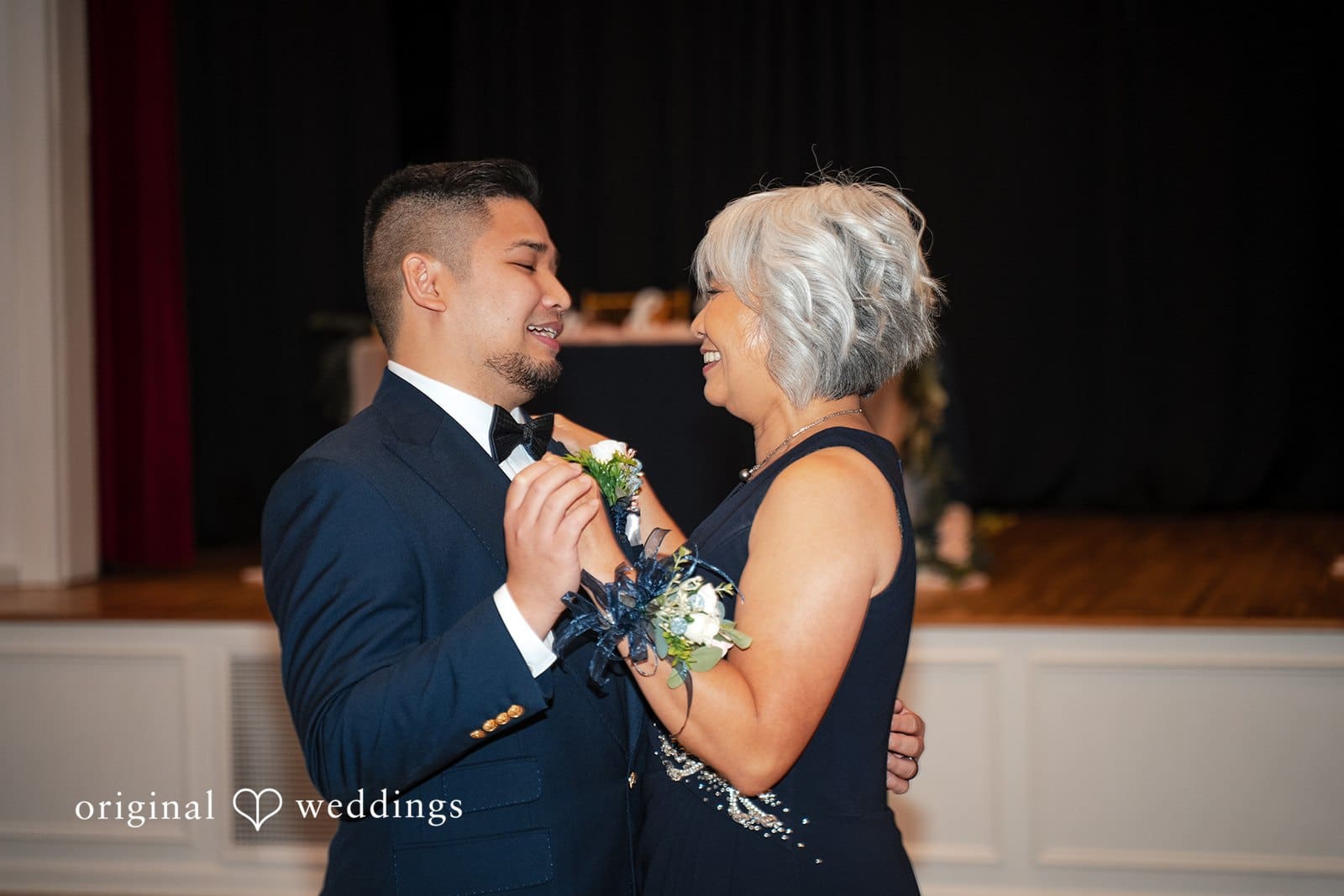Groom dancing with his mother during the reception
