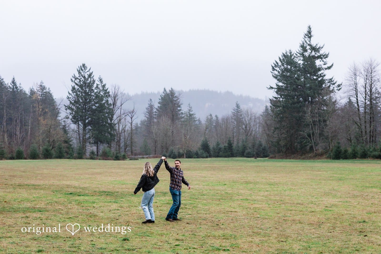 The couple having a playtime in the field